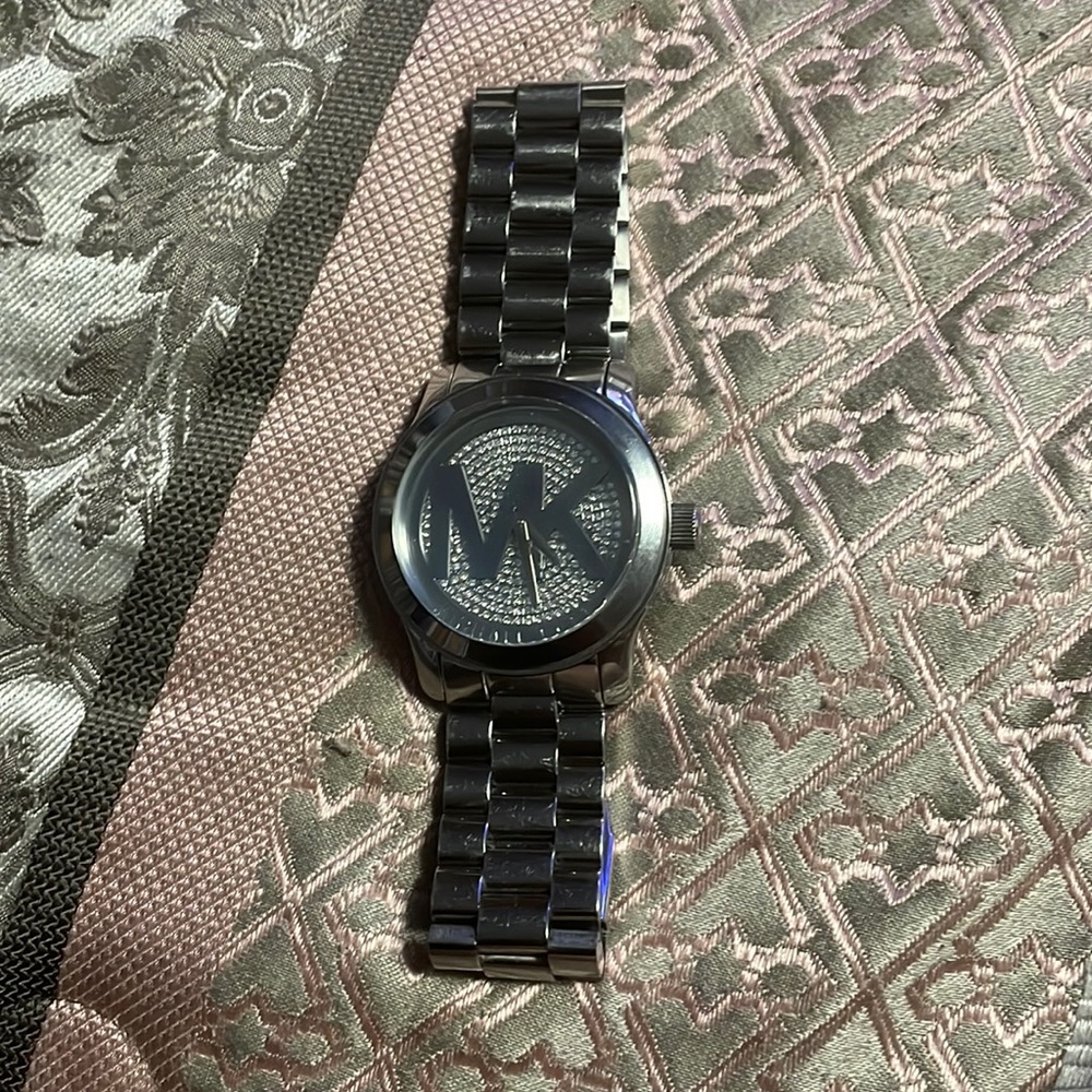 Women’s watch needs battery with a few scratches on back